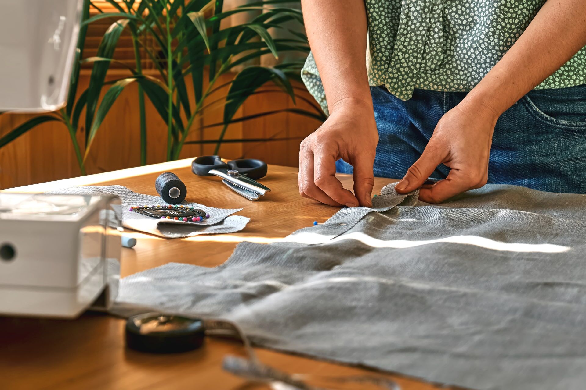 woman-sketching-pattern-on-a-linen-fabric-seamstre-2025-03-09-02-31-58-utc-min.jpg